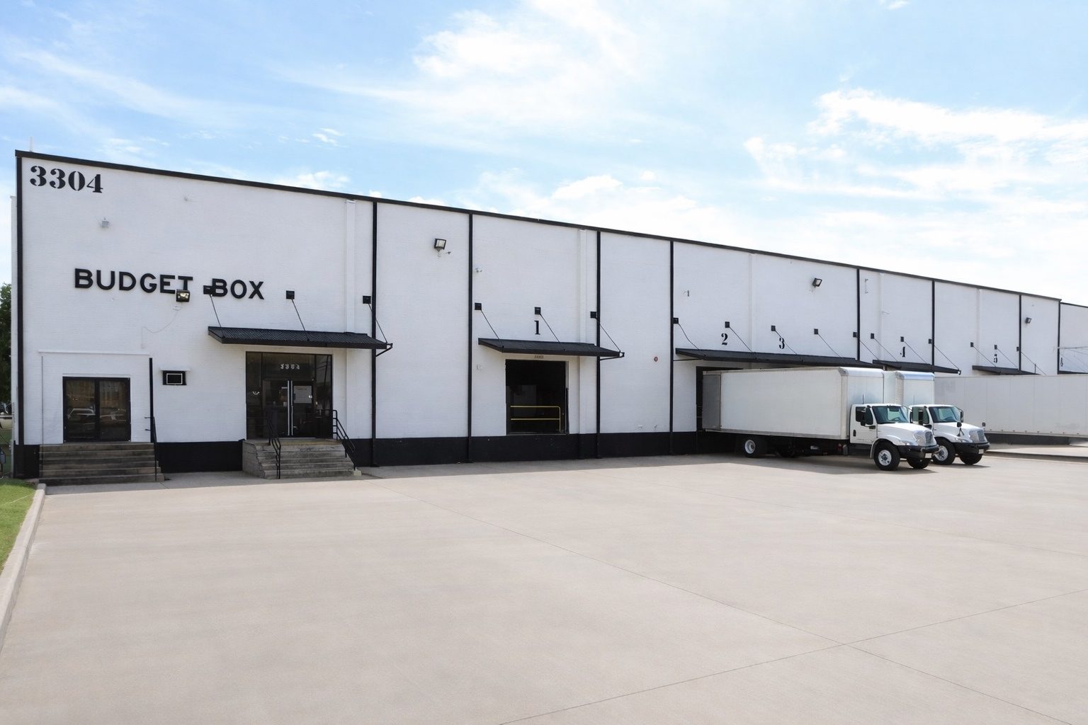 Budget Box full front facade with bay doors