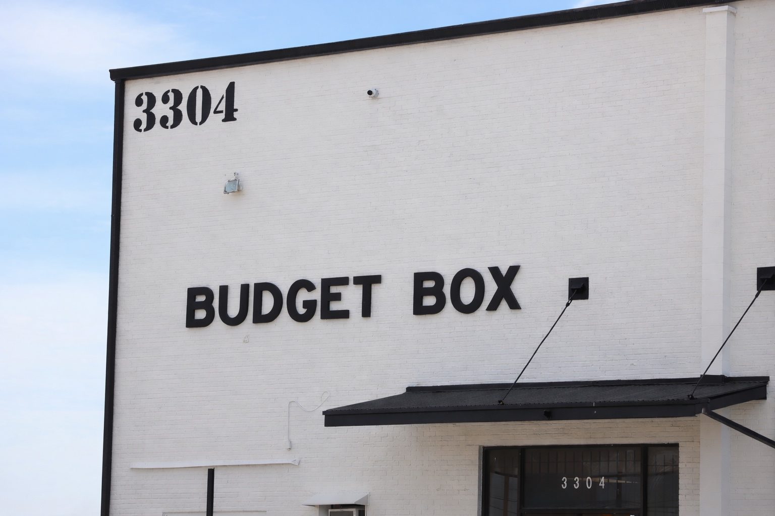 Budget Box warehouse angled view with facility signage