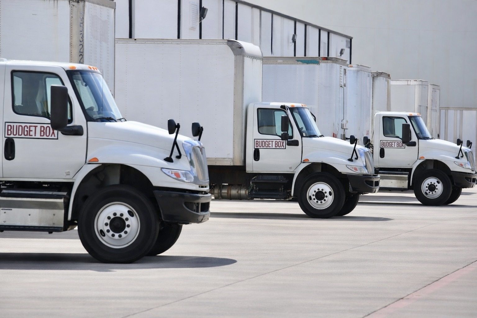 Budget Box delivery trucks at the loading dock